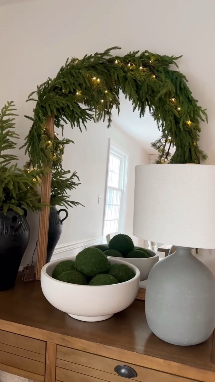 Easy garland idea for a mirror! LED garland is sold out but you can use LED string lights too!

#LTKStyleTip #LTKHoliday #LTKFindsUnder50