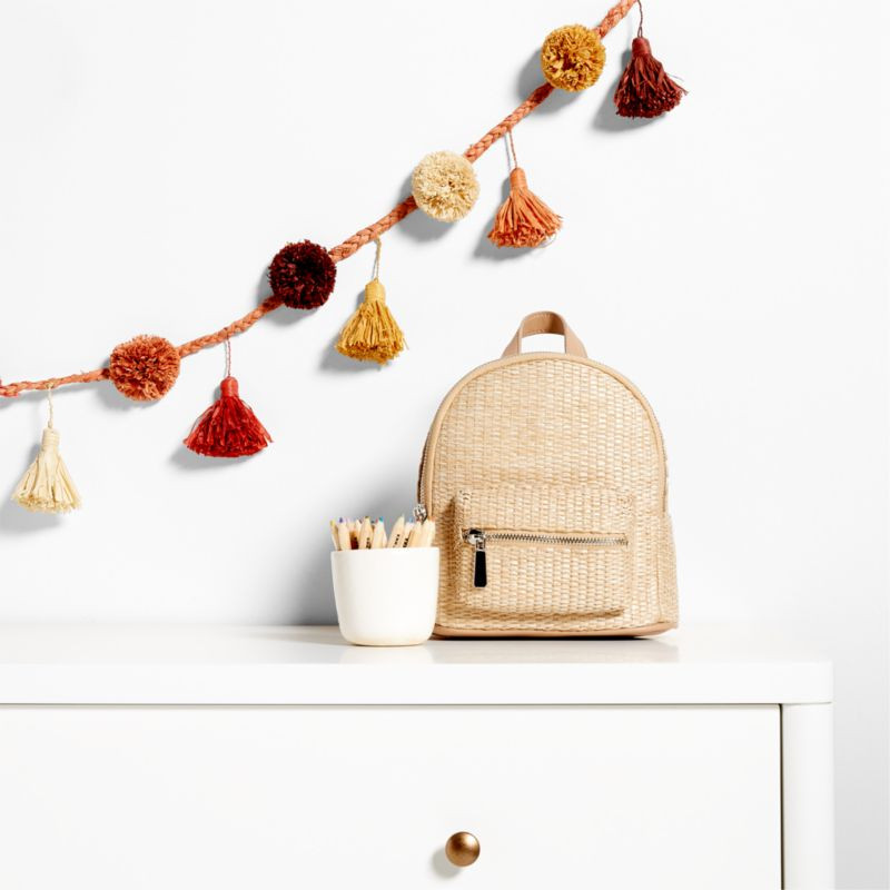 All Across Africa Pink Pom Pom Garland | Crate & Kids | Crate & Barrel