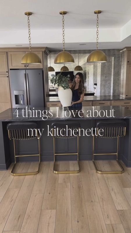 4 things I love about my kitchenette! 

1. My antique mirror backsplash 
2. My brass sink and faucet
3. My black (honed) marble countertops
4. Large island (4’3”x8’5”)


Faucet, wet bar, counterstools leather stools, brass chairs, pendant, whare pendant home decor 

#LTKStyleTip #LTKHome #LTKSaleAlert