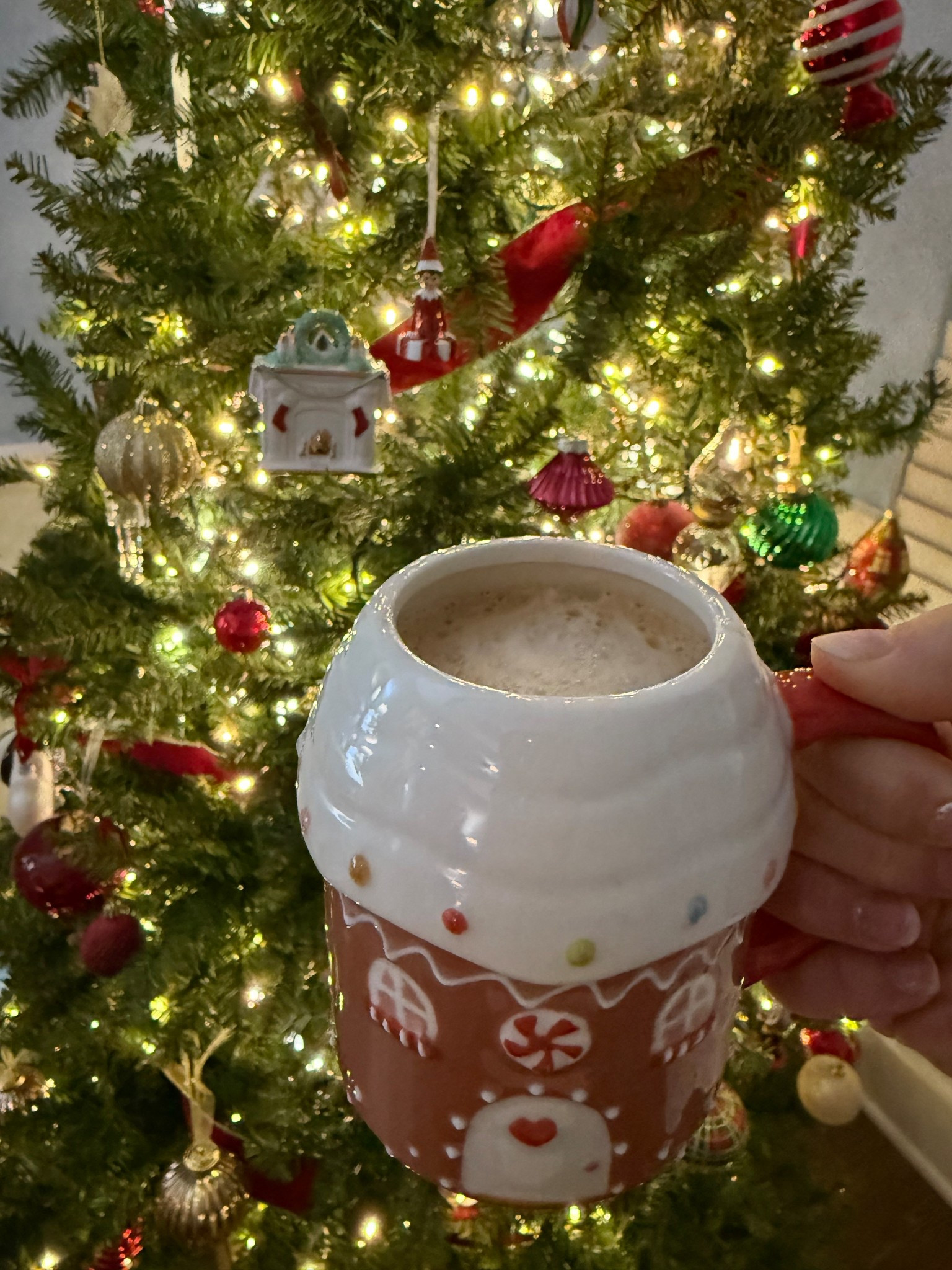 Gingerbread house mugs, Christmas tree ornaments, gingerbread Christmas decorations 

#LTKSeasonal #LTKHome #LTKHoliday