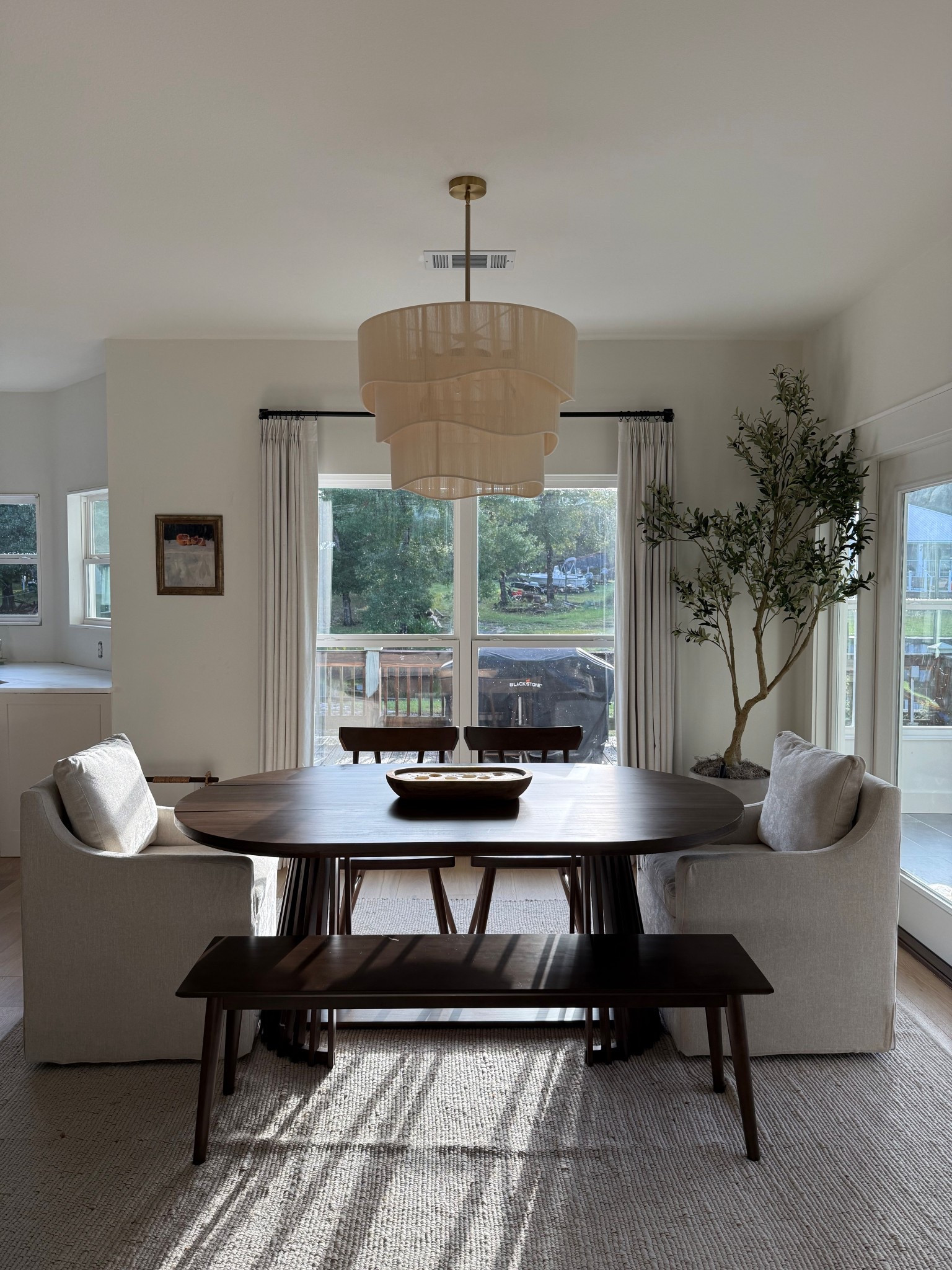 Slipcovered chair. Dining chairs. Dining table. Dining room rug. Dining room. Dining chandelier  

#LTKHome