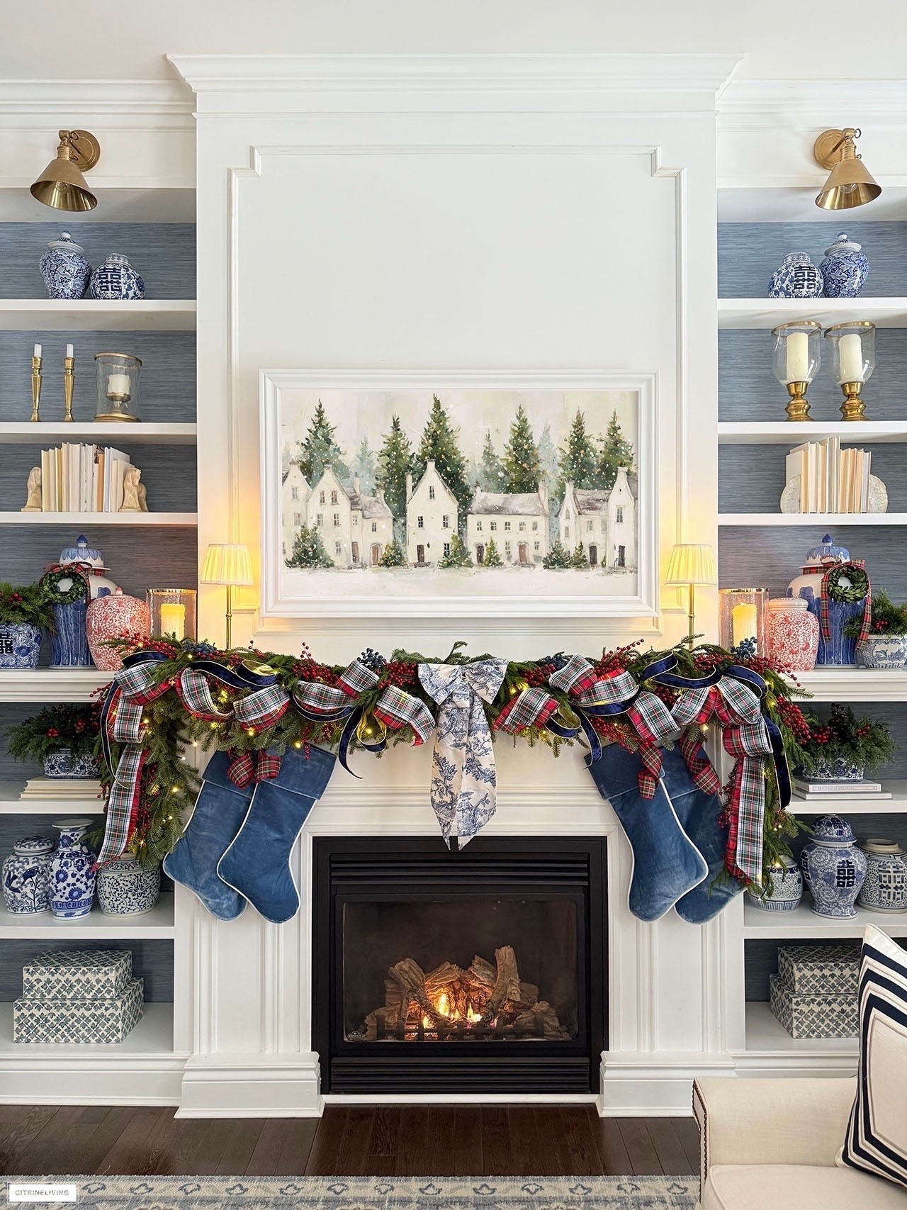 Our classic Christmas mantel! Gorgeous velvet stockings, mixed lush greenery, mixed plaid ribbon, velvet ribbon, red berry picks finished with a beautiful toile bow is layered and chic for a festive holiday look! 



#LTKHome #LTKHoliday #LTKSeasonal