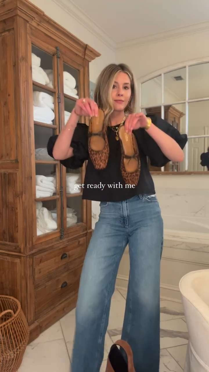 on team mix black & brown 🤎🖤 such a fab, easy outfit for fall! this black top from Shopbop is sooo stunning, I'm obsessed with the puff sleeves. paired with one of my favorite wide leg jeans from Paige & linking a few leopard flats that tie the look together! this suede Strathberry bag is also such a good staple – looks so gorgeous & the perfect size for everyday wear. wearing size small shirt, & 26 jeans! 

 #LTKSeasonal #LTKStyleTip #LTKShoeCrush