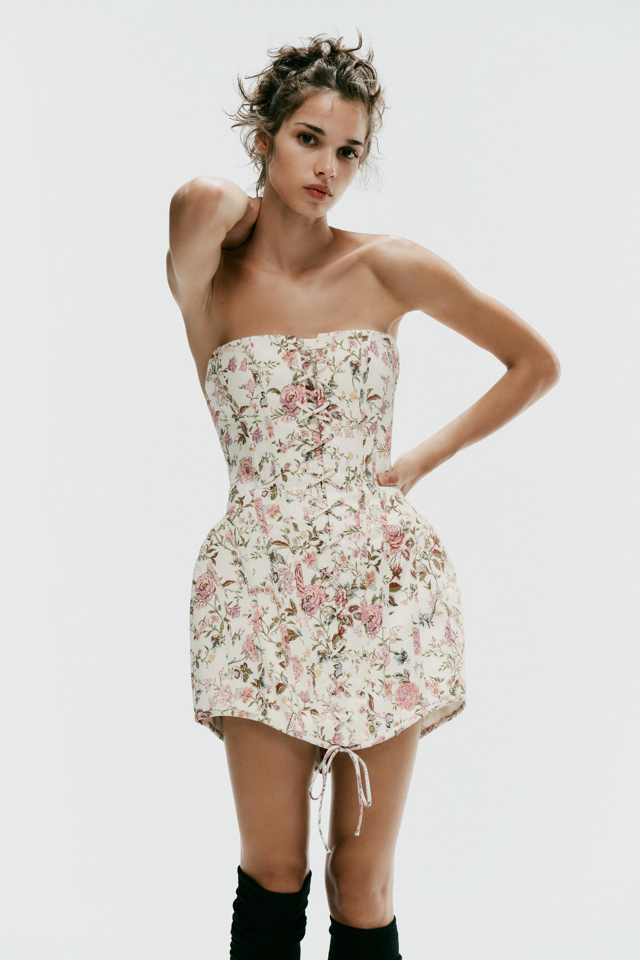 Model height: 176 cmShort corsetry-inspired dress with a straight neckline and off-the-shoulder d... | Zara UK