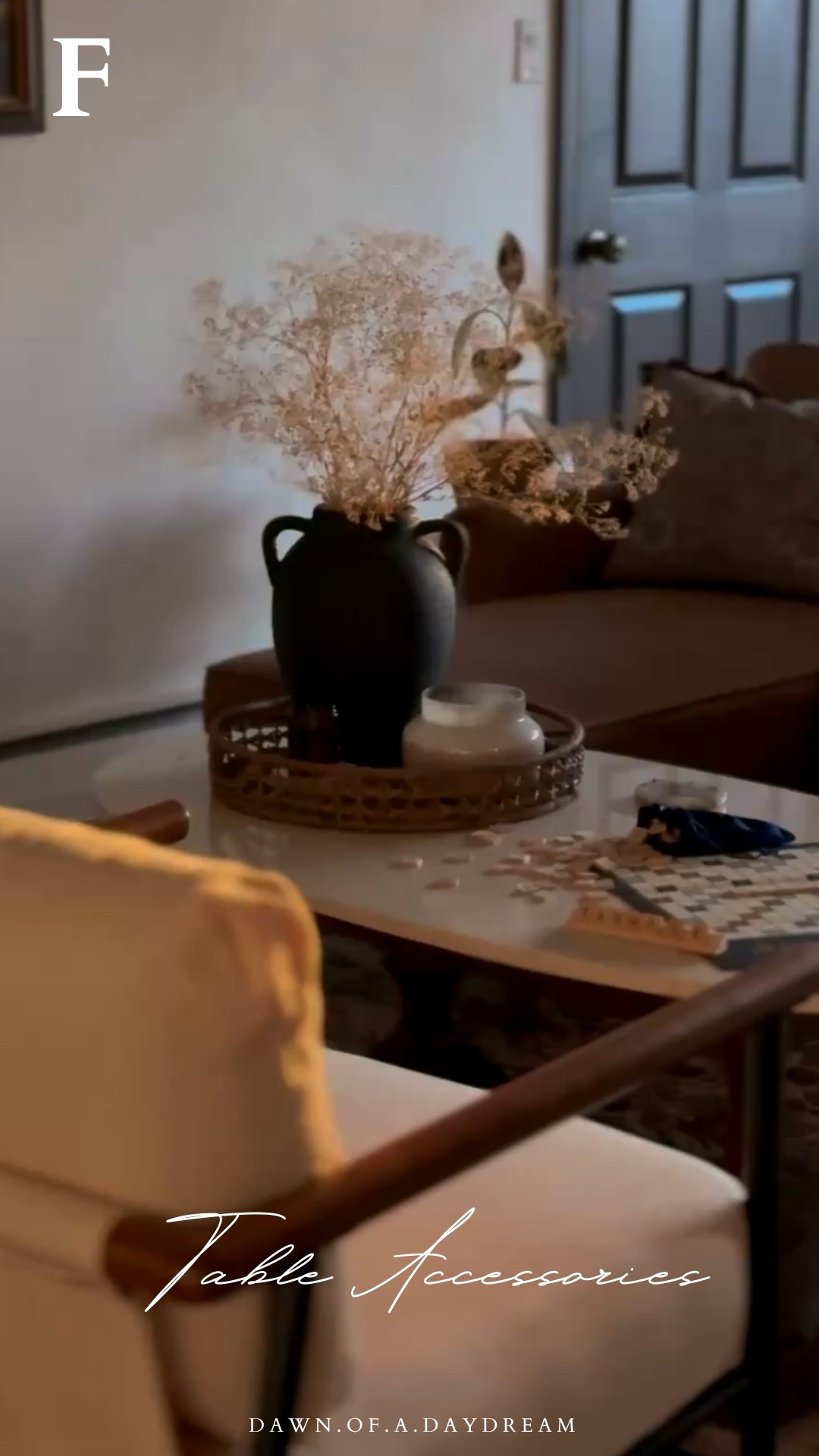 F: Coffee table accessories 

Moody decor aesthetic boardgames travertine dark wood patina vessel dried flora 

#LTKHome #LTKFindsUnder50