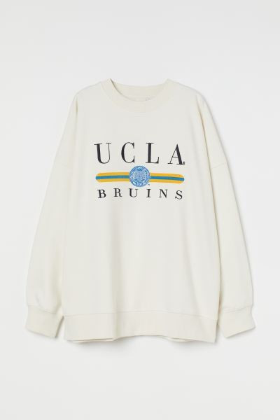 Soft, crew-neck sweatshirt with a printed design at front. Heavily dropped shoulders, long sleeve... | H&M (US + CA)