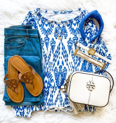Blue + white 💙 This fun new printed sweatshirt has the cutest pattern and tie wait detail. We also linked this versatile bag, sandals, and accessories. This woven blue headband is another fave new arrival as the color is so hard to find. ☺️ Shop it all via the LTK app or head to our link in bio. 🛍

#LTKFind #LTKsalealert #LTKstyletip