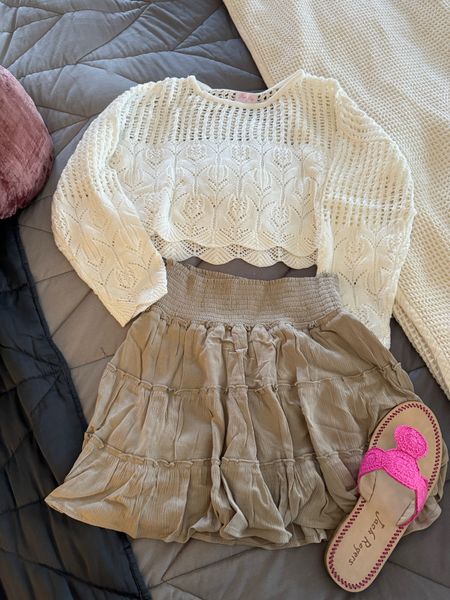 Love this outfit idea! Crochet sweater, skort, and crochet sandals. 

#LTKfindsunder50 #LTKfindsunder100