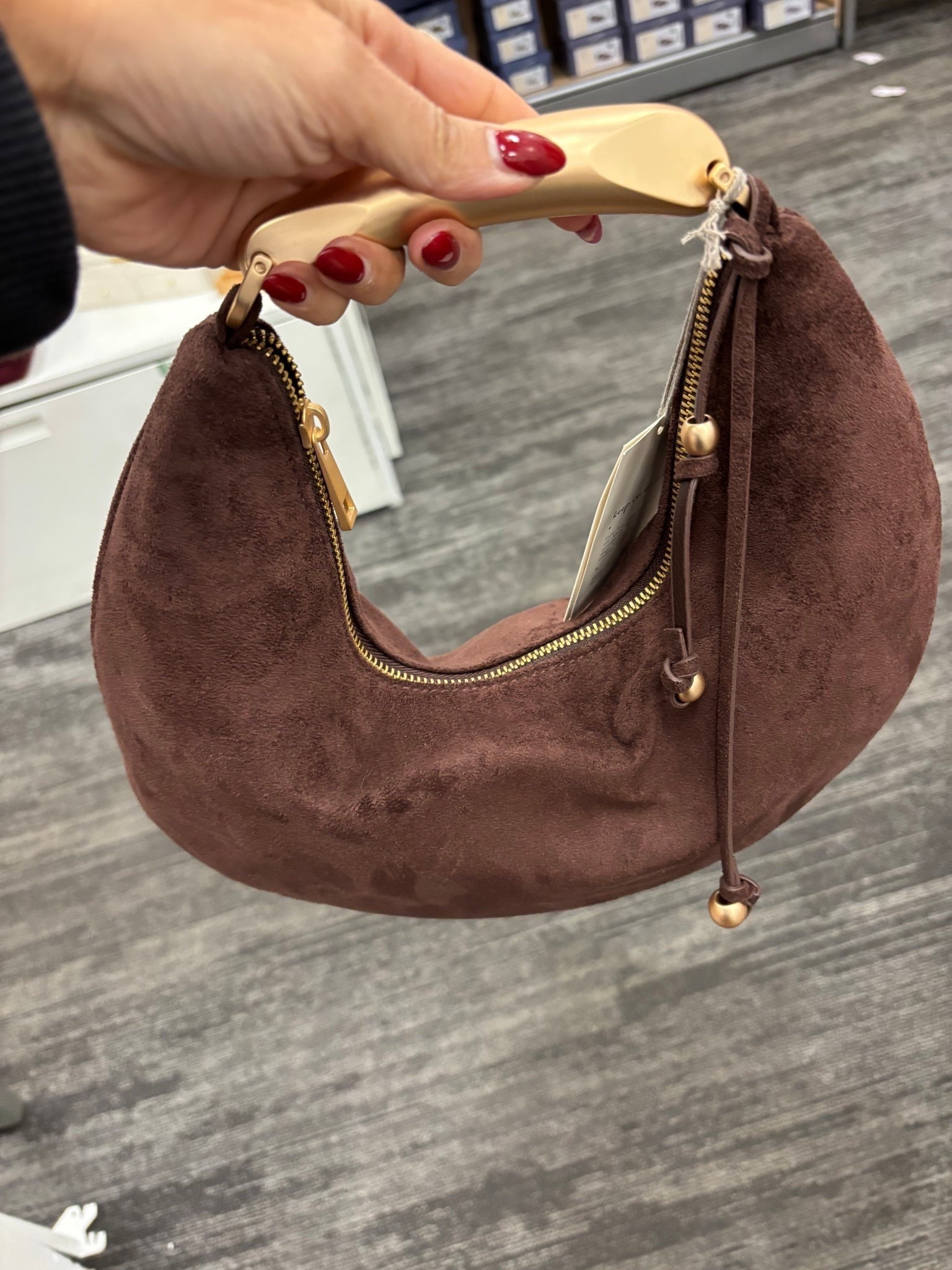 Faux suede chocolate brown crescent bag 

#LTKFindsUnder50 #LTKSeasonal #LTKGiftGuide