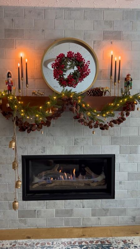 Christmas 2023 Fireplace Mantel.  Loving the more traditional colours this year!

#LTKHoliday #LTKSeasonal #LTKhome