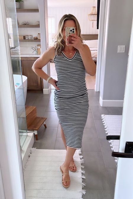 Navy and white striped body con tank dress. Would be so cute on a cruise. Great for spring, summer, Memorial Day, Fourth of July.

Fit is TTS, very comfortable.

These tan sandals go with everything and they are only $12.99.