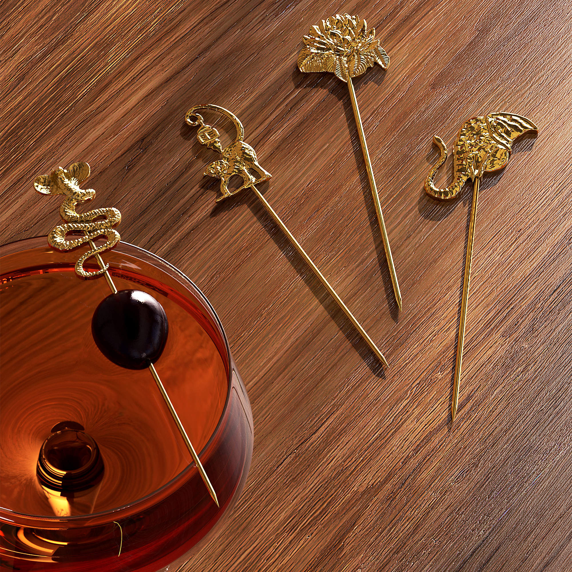 Brass Cocktail Picks Set of 4 - The White Lotus + Reviews | CB2 | CB2