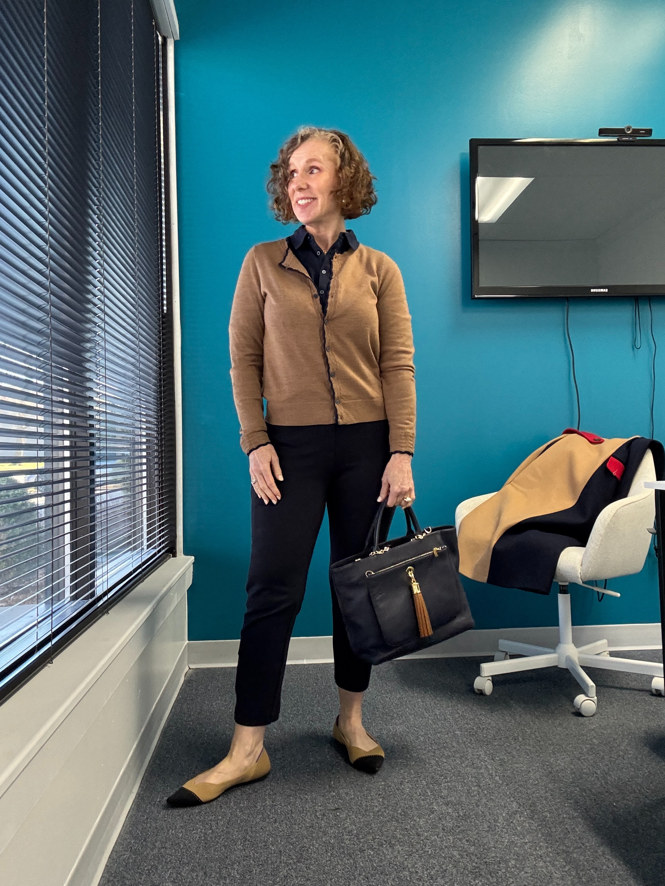 Today's work outfit for a morning when the calendar said Spring, but the thermometer said COLD.

My pants are navy, and they're available in black now.

I've linked similar pieces. 

 #LTKMidsize #LTKWorkwear #LTKShoeCrush