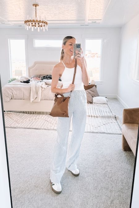 If you’re tall and want some linen striped pants that actually have plenty of length, I found the best pair from Cotton On! These ribbed tanks from amazon are a great staple too. My go to brown leather purse from Able and my go to Adidas (half the price of sambas but look almost identical!)

#LTKstyletip #LTKSeasonal #LTKfindsunder50