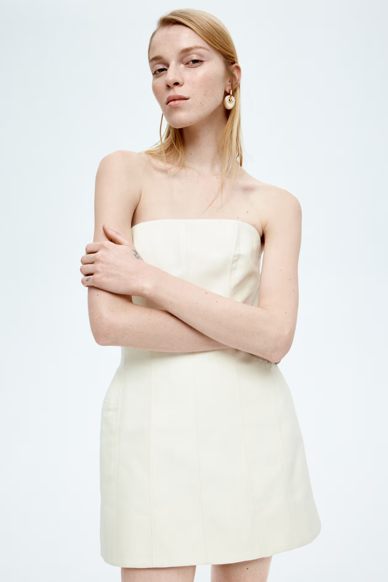 Exaggerated-hip mini dress | H&M (UK, MY, IN, SG, PH, TW, HK)