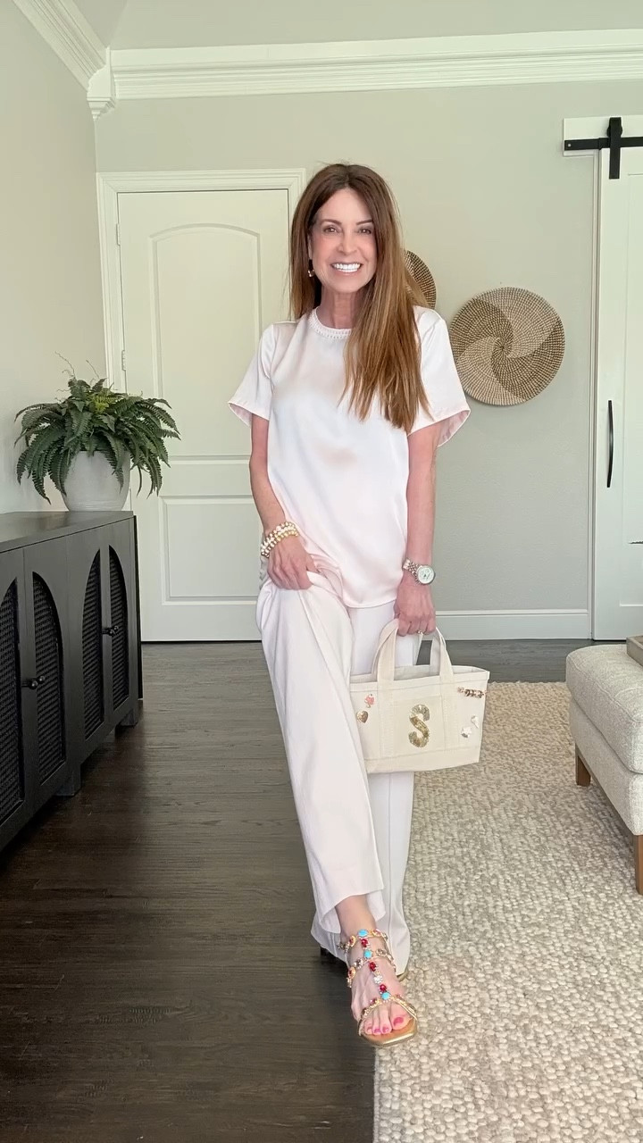 This blush pink colored top and pants are perfection for wearing with my new sandals, don’t you think?! These were a treat to myself for my birthday last month. 

Wearing size XS pants and size S top.
Shoes fit tts. Wearing my regular size 6.5.
The fun stretch gold and pearl bracelets and gorgeous new earrings are from Dean Davidson.

#springstyle #womenover50 #shoeaddiction #lyssenewyork #petite