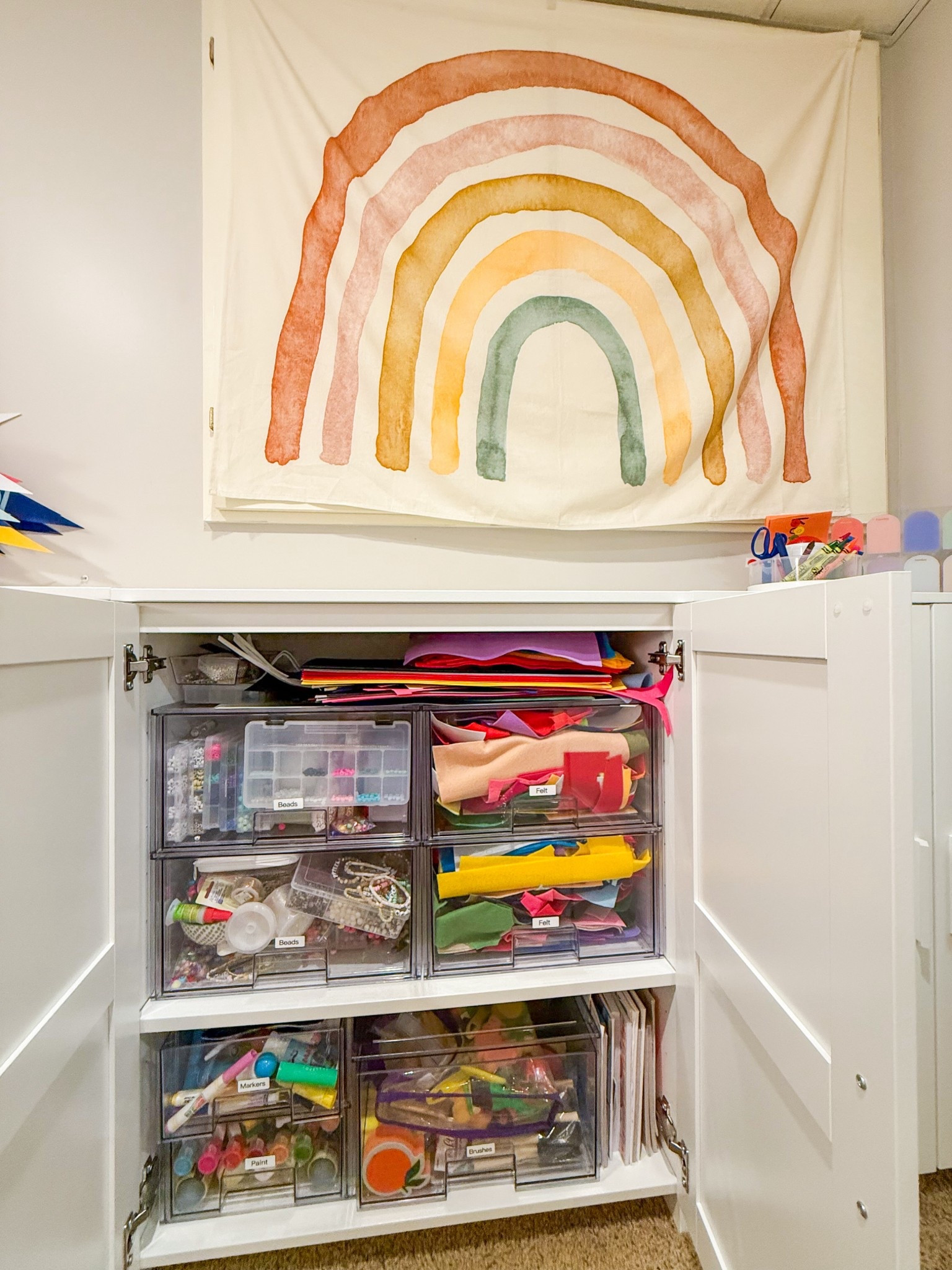 These stackable acrylic storage drawers are a game changer when organizing craft supplies, toy/games, snacks, allll the things! I used the Bino brand in the photo here but linked others I use around the house  
