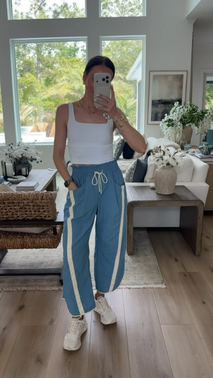 Such a cute sporty set, these track pants are lightweight and so easy to style for everyday. Paired with a simple white tank and sneakers, it’s the perfect casual look that still feels put together.

sporty outfit, track pants outfit, casual athleisure, everyday outfit, comfy style, spring outfit, relaxed fit pants, sneaker outfit, effortless style, annabrstyle

#LTKootd #LTKTravel #LTKActive