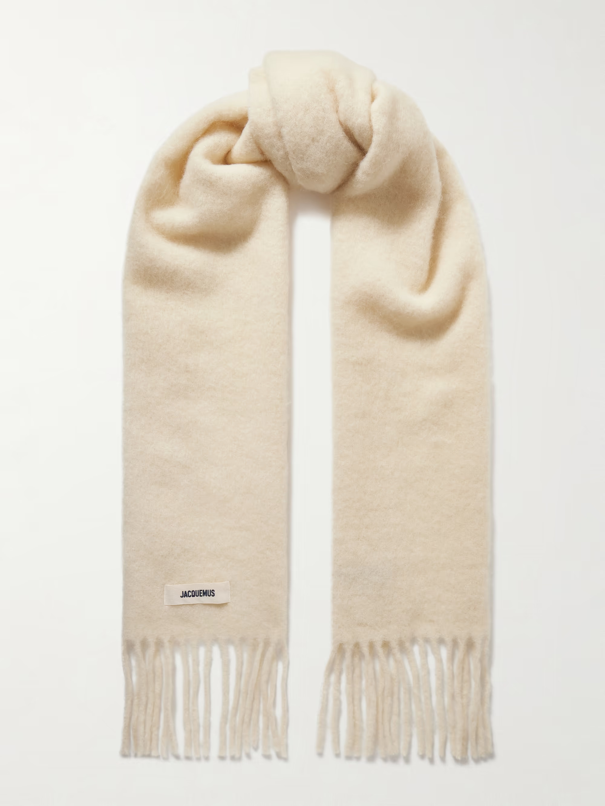 Jacquemus' scarf has a cozy, oversized shape that envelopes you in warmth. It's been knitted in I... | NET-A-PORTER (US)