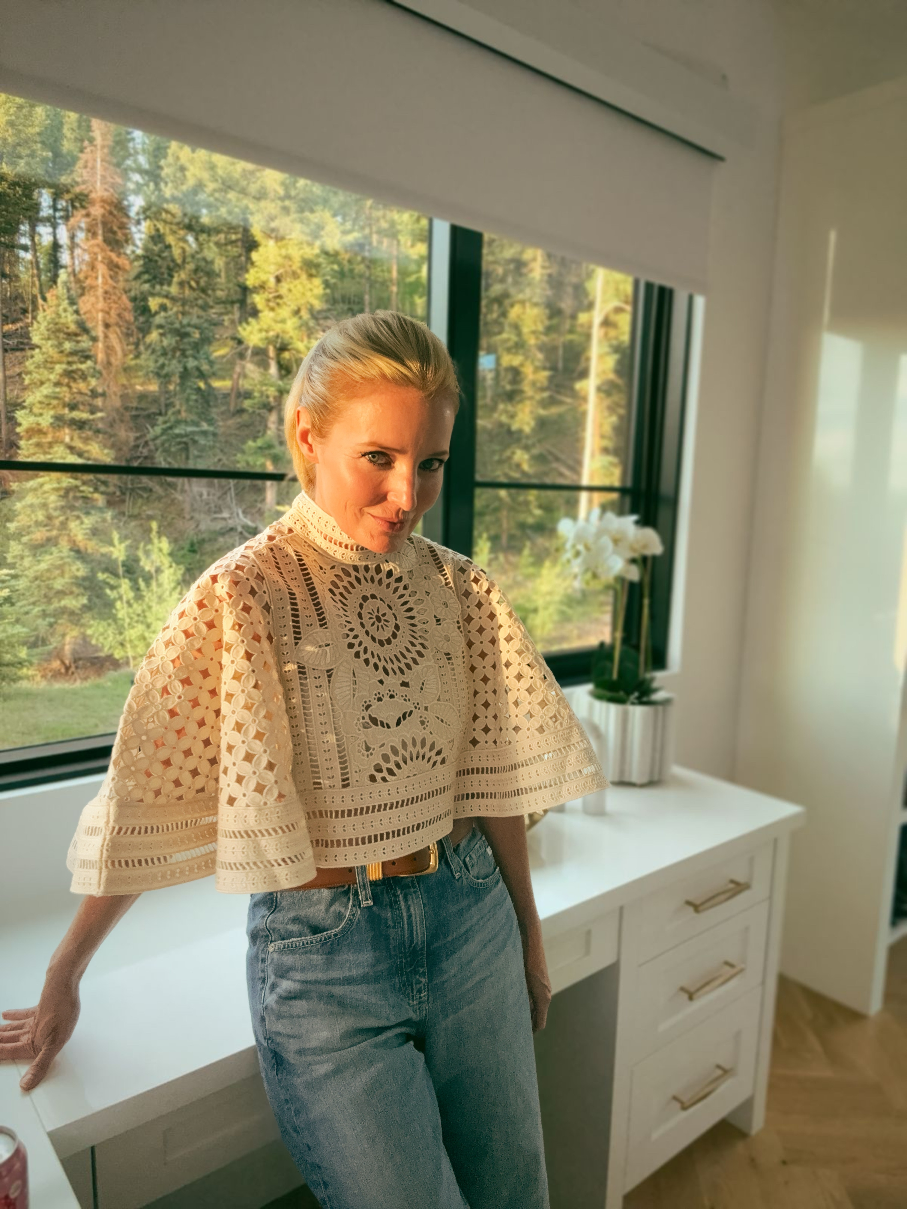 A statement top changes everything about an outfit!

This Zimmermann cream broderie anglaise cape does exactly that — intricate floral cutwork, dramatic wide sleeves, mock neck; paired with nothing more than straight leg jeans and a tan leather belt. The top is the outfit. Everything else just gets out of the way. 

 #LTKgrwm #LTKootd #LTKOver40