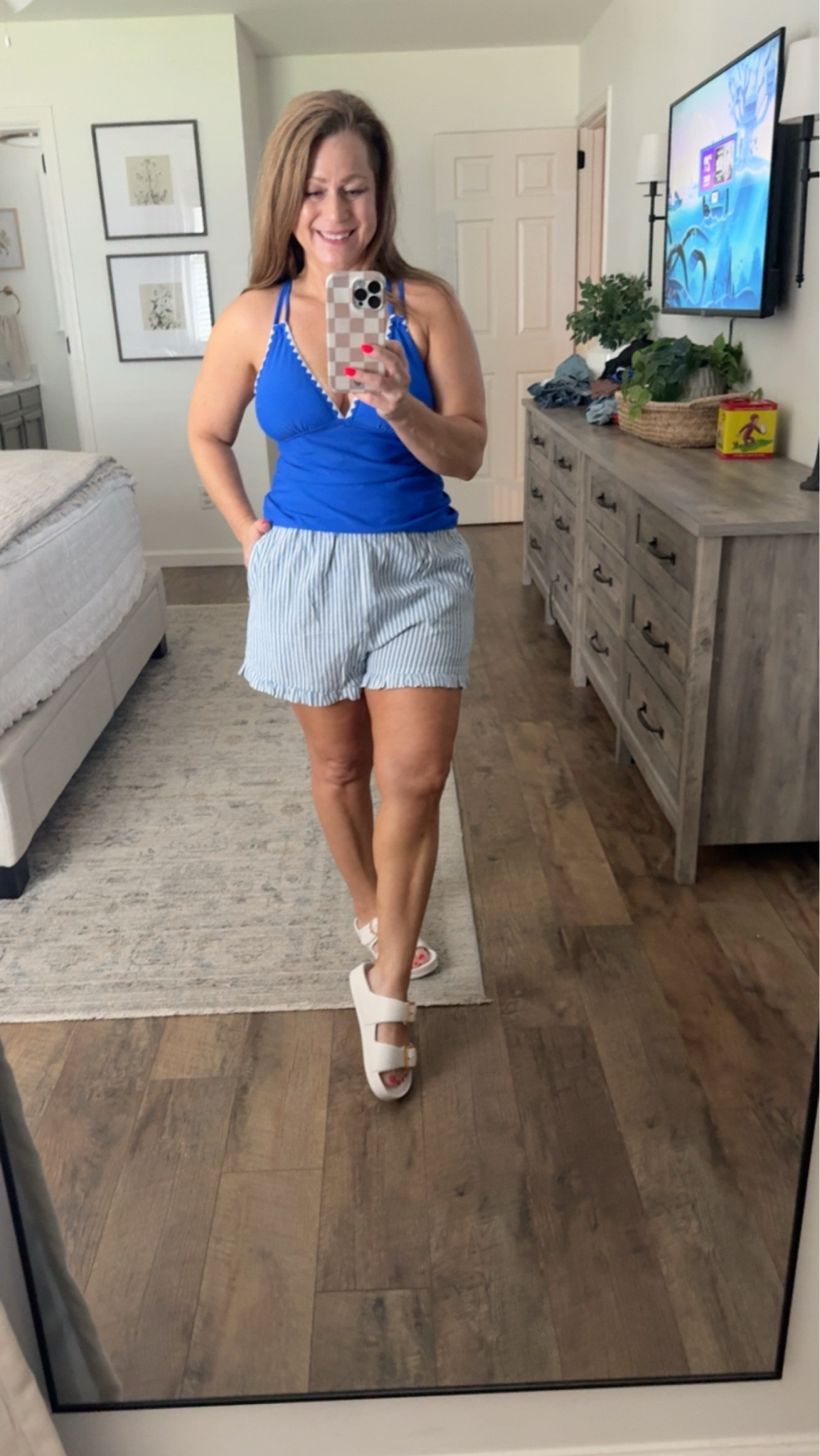 Ruffle trim shorts with pockets 
Come in stripe or gingham plaid
Multiple colors

Weat to lounge, casual outfit or as a swim coverup

#LTKootd #LTKSeasonal #LTKPetite
