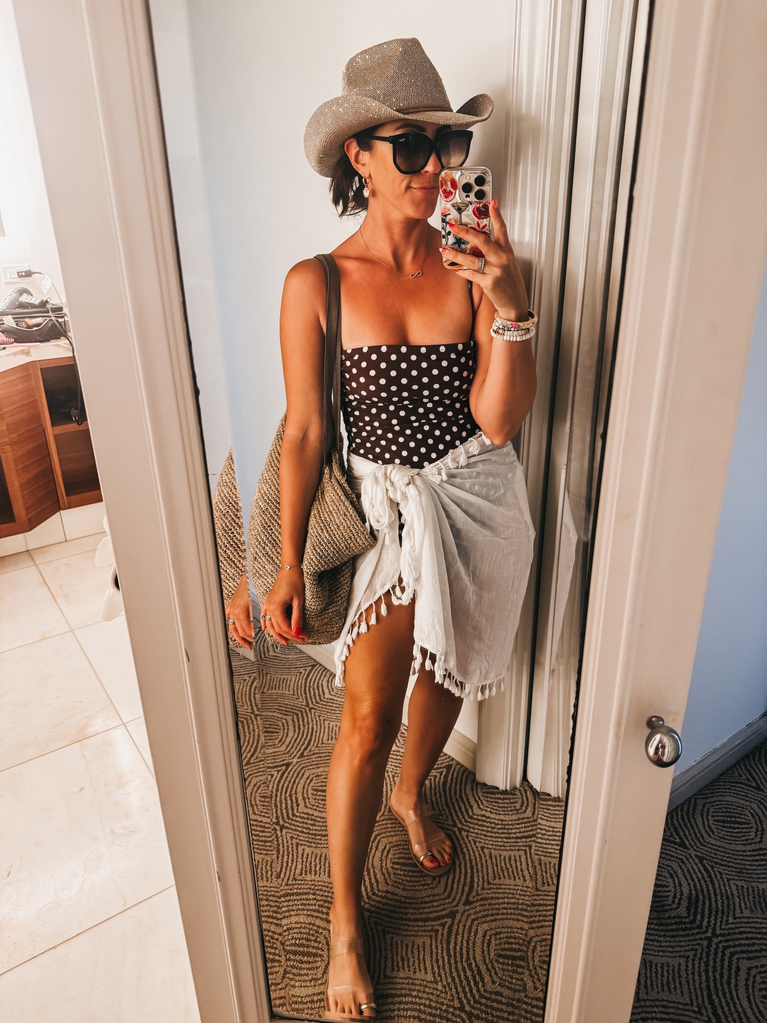 Coastal cowgirl! 🤠 🤎🌊🥥 

*Brown and white polkadot swimsuit — high-cut & a little cheeky (size medium) 
*sparkly, cowgirl hat — SO pretty in the sun!✨☀️✨
 * one of my favorite easy throw on & go sarong for the beach or chasing kids around the pool! 💦

Target, swim, Amazon fashion, anthropologie, pool look, vacation, swimsuit style, beach look, pool style 

#LTKTravel #LTKOver40 #LTKSwim