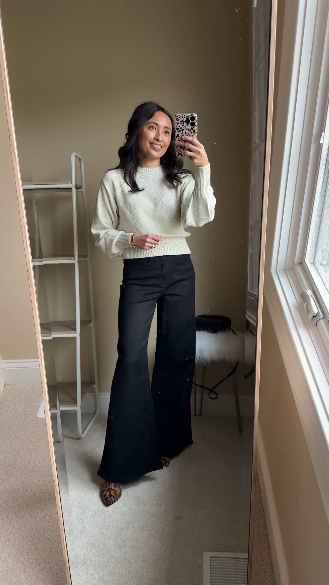 Warm new year’s eve outfit. NYE outfit. 
Subtle sparkle to this sweater. I would size up. 
Flare black jeans with stretch. True to size. 
Leopard booties. 


#LTKFindsUnder100 #LTKFindsUnder50 #LTKOver40