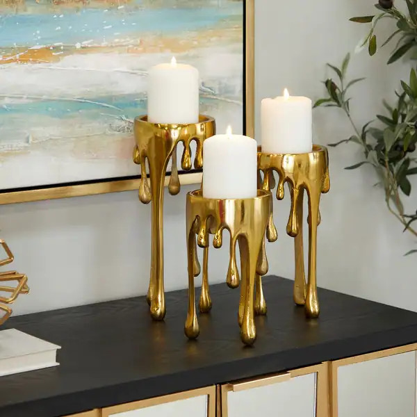 CosmoLiving by Cosmopolitan Silver, Gold or Black Aluminum Abstract Pillar Drip Candle Holder (Se... | Bed Bath & Beyond