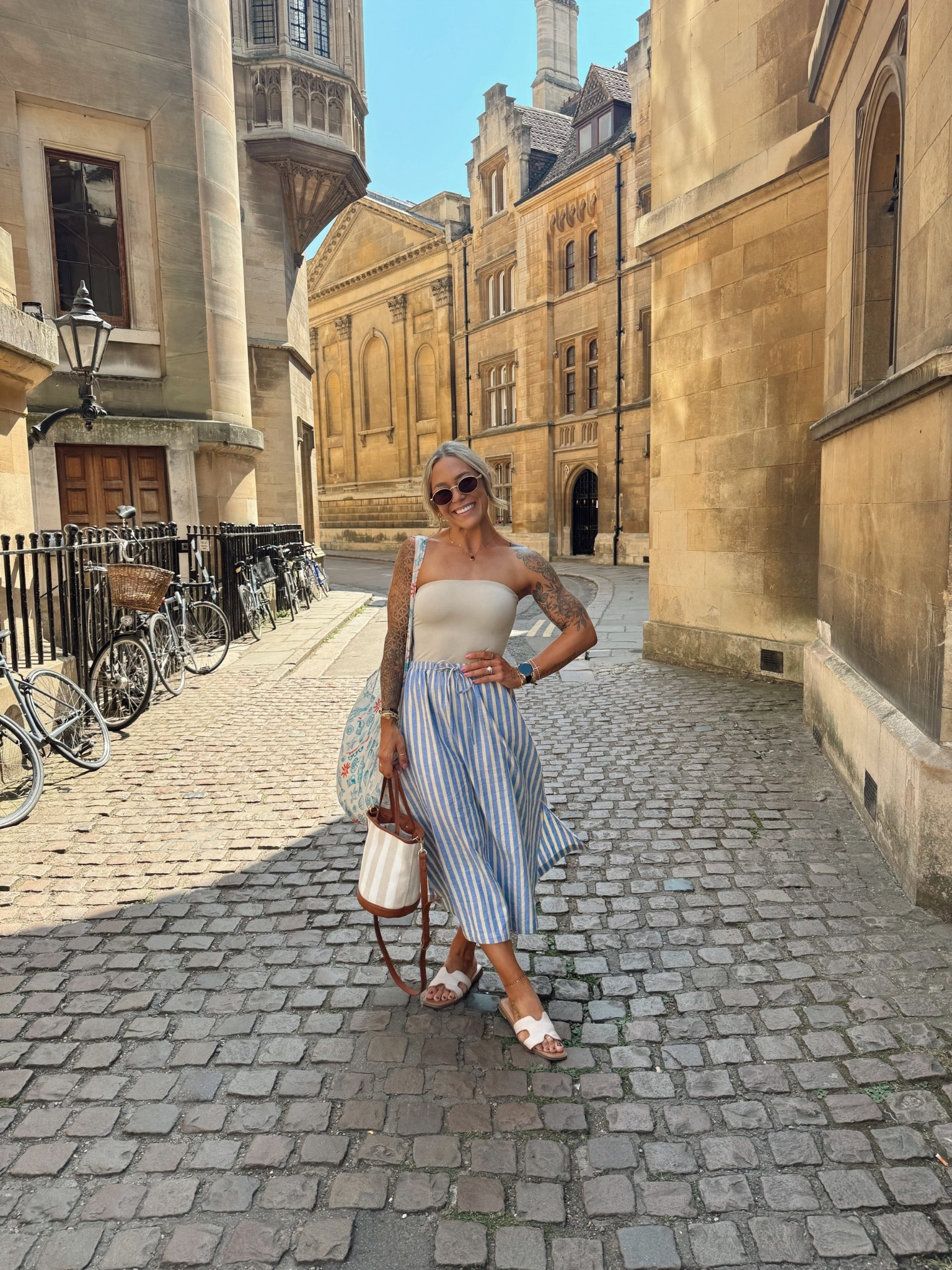 LOVED this fit so much🛶🌼🇬🇧☺️

My fave Amazon tube top (S) / linen flowy skirt from Target (XS) & these sandals! I size up a 1/2 size 🤎 on sale! 

Summer style / target finds / Amazon / Holley Gabrielle / stripes / cute / casual / reel 

#LTKSaleAlert #LTKSummerEdit #LTKFindsUnder50