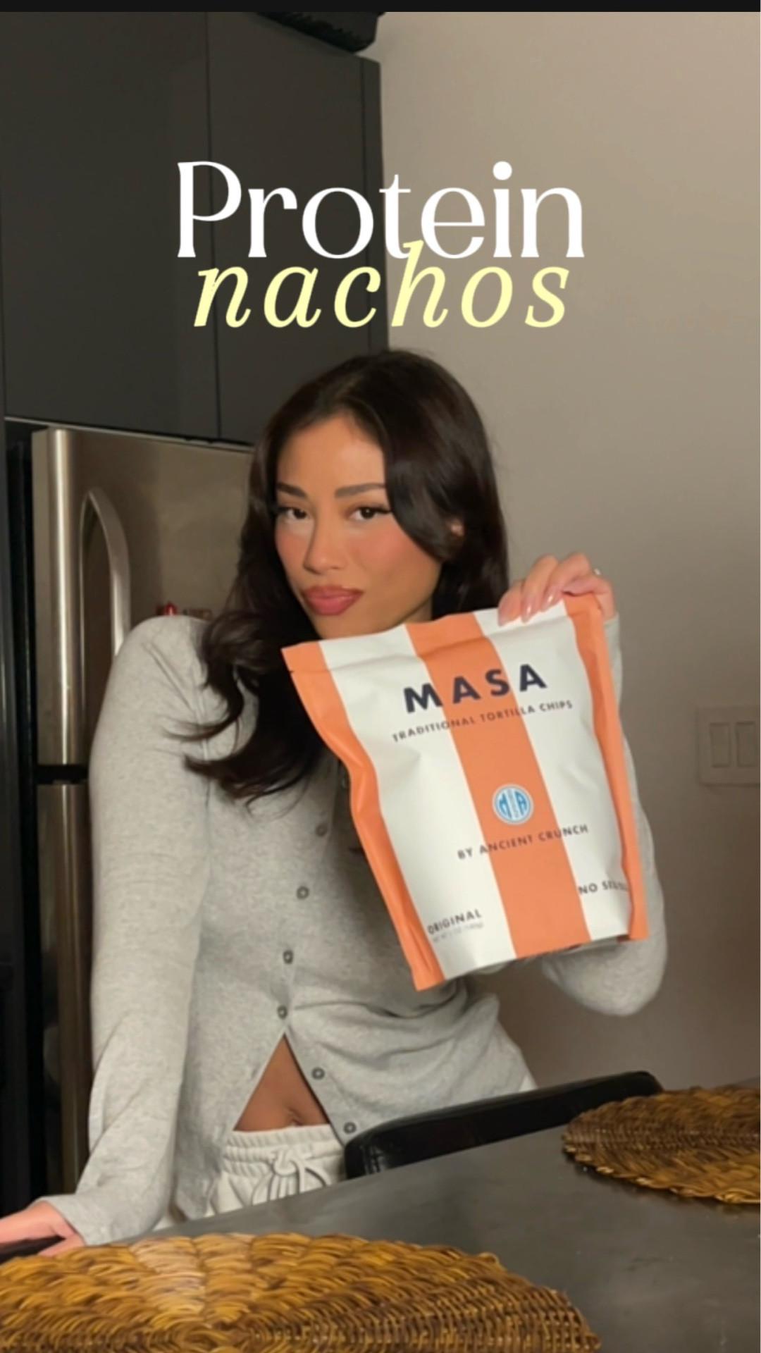 Protein Nachos Recipe ✨
Serves 2

Ingredients:
	• 18 Masa Chips (300 cal, 4g protein)
	• 1 lb lean grass fed ground beef 93/7 (340 cal, 25g protein)
	• 1 cup Fage 0% Greek yogurt (130 cal, 23g protein)
	• 3 slices yellow cheddar cheese (90 cal ea, 15g protein)
Total protein: 67g (34g per person)

Instructions:
- season ground beef with salt, pepper, cumin, garlic powder, onion powder (or use taco seasoning packet)
- cook ground beef on stovetop until brown. Drain the meat from any oils after cooking.
- place parchment paper in air fryer and spread chips in an even layer avoid over crowding
- place cheese I used 2 slices of yellow cheese make sure to rip into pieces
- add ground beef on top of chips
- finish with a sprinkle of a little more cheese on top
- air fry at 350 degrees for 3-5 minutes check if it cooks quickly depending on oven
- garnish with green onion and 1 cup of Greek yogurt 
- serve and enjoy immediately!!

#LTKfoodie #LTKfitnessgoals #LTKdayinmylife