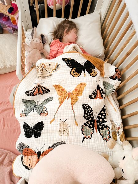 We transitioned Ainsley from her crib to her toddler bed and while pink is still her favorite color, I added this beautiful butterfly quilt on top of her comforter and I got lots of requests for the link after I shared it! Both of my kids have small quilts from this company that they use as their “blankie” and they hold up really well after years of washes.

nursery / kids bedroom

#LTKkids #LTKhome #LTKfamily