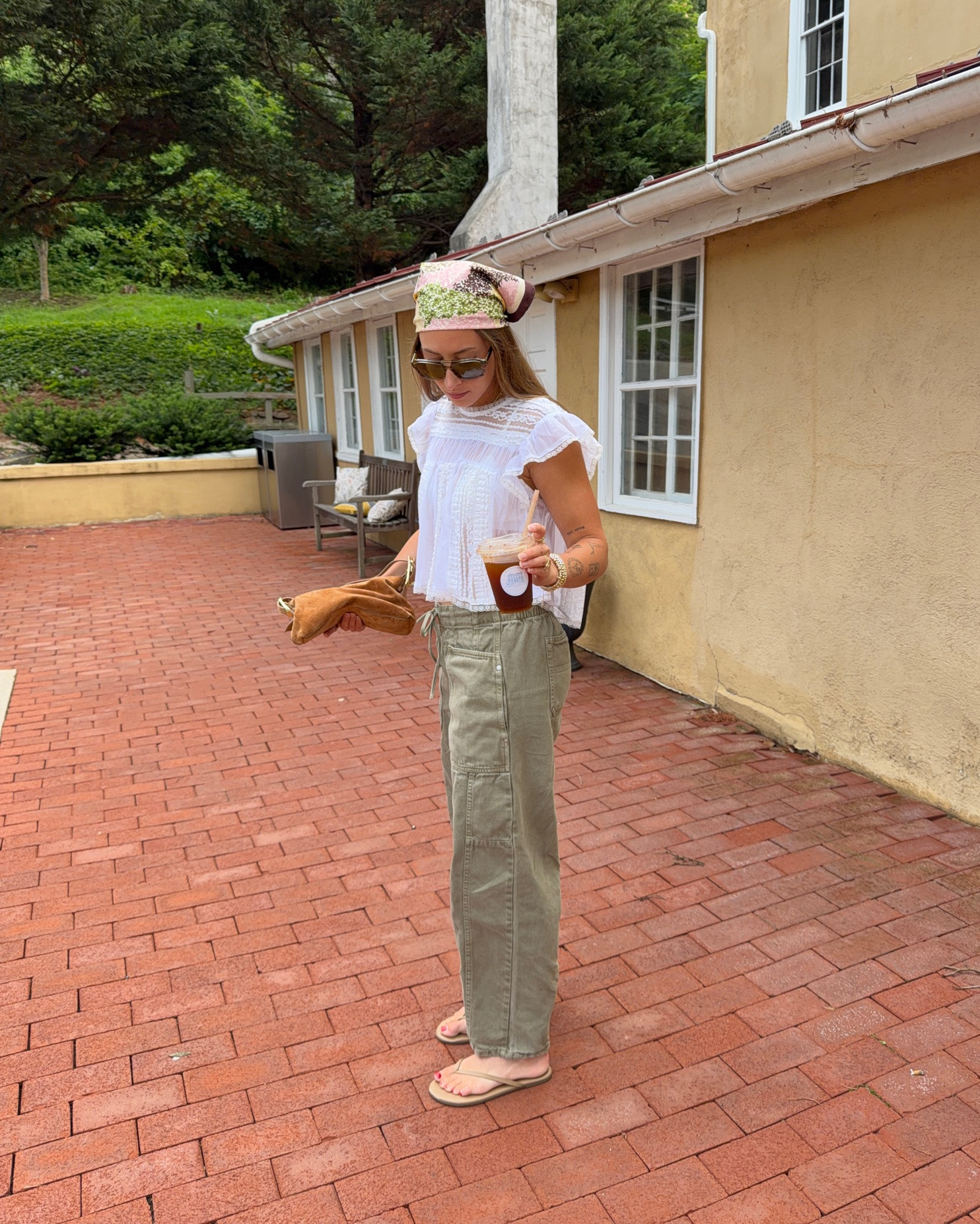 8/11/26 Summer-to-Fall Casual Outfit 🤎

Slowlyyyy starting to mix a little fall into my summer outfits. 🤎 Styled these olive green barrel pants with a feminine Free People lace top, Amazon bralette, my TKEES flip-flops I’ve worn nonstop all summer, Mango bandana, and J.Crew suede bag.

My pants were a TJ Maxx find from Scotch & Soda last year, so I sadly can’t link the exact pair, but I’ll link something similar! Sunglasses are VEHLA for reference. Such an easy, realistic transitional outfit that still works for these warmer August days. ✨

#LTKootd #LTKSeasonal