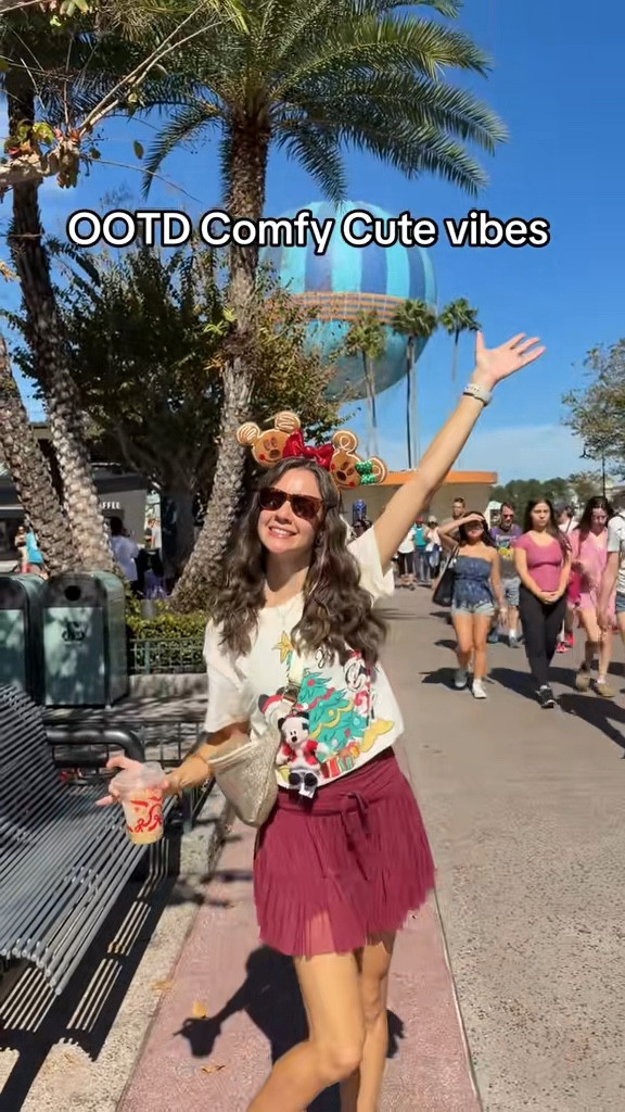 Christmas holiday Park outfit of the day - comfy cute, can happily walk around all day. Minnie ears and santa mickey charm are from Disney Parks. Shirt is from 5 below - great deal. Pirouette skort from popflex - there are so many dupes out there, please support her and get the original if you want one! quality is unmatched - i have several in different colors. 

#LTKActive #LTKootd #LTKCyberWeek