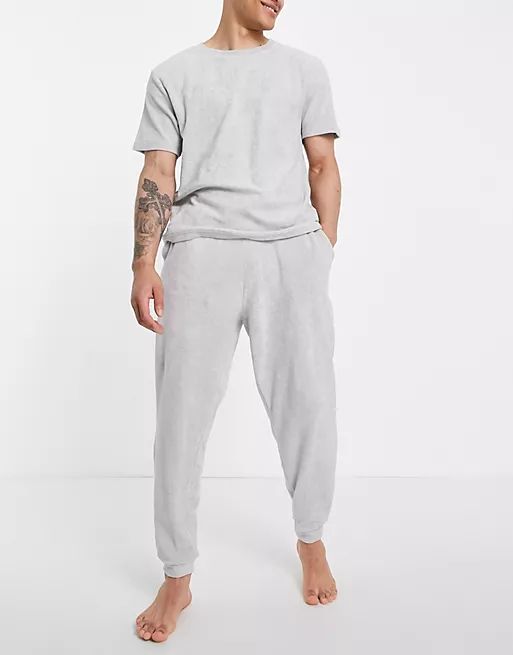 ASOS DESIGN lounge t-shirt and jogger pyjama set in grey towelling | ASOS (Global)