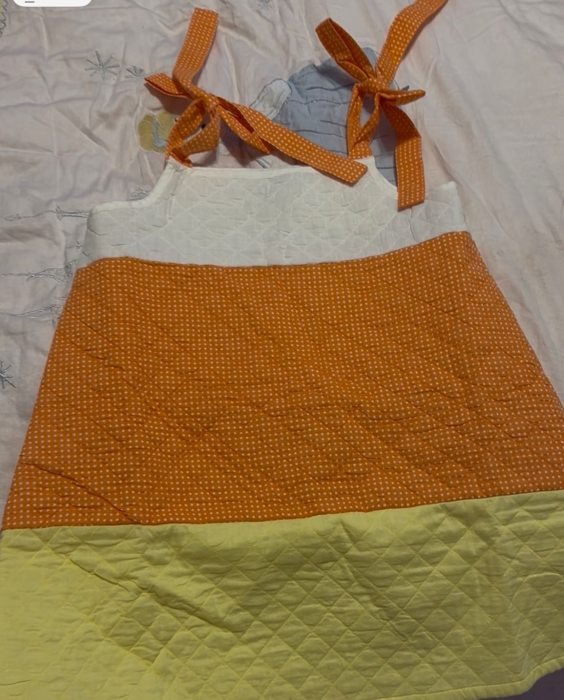 Candy corn girls dress 

#LTKFamily #LTKKids #LTKSeasonal