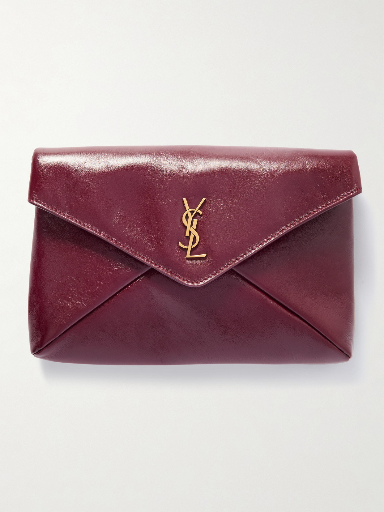 SAINT LAURENT - Cassandre Large Glossed-leather Clutch - Red | NET-A-PORTER (US)