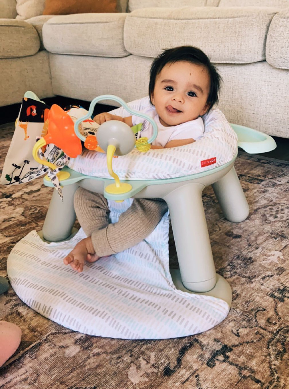Baby is four months and wants to be sitting mostly. So we got him this skip hop chair and he is loving it. He will sit on this chair for quite a while.