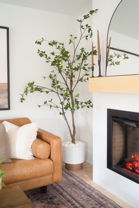 Faux 8ft minimalist green citrus tree — perfect corner piece paired with a wooden base planter from Walmart! 

#LTKhome #LTKstyletip