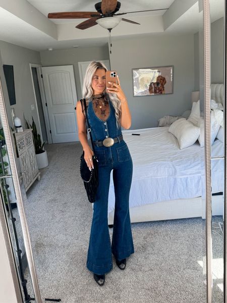 size Xsmall in jumpsuit + i’m 5’10 for height reference. size up in booties. size small in belt. size small in sleeveless lace top! purse is old so linked similar 

western fashion 
country concert 
cowgirl boots 
festival ootd 

#LTKfindsunder50 #LTKstyletip #LTKFestival