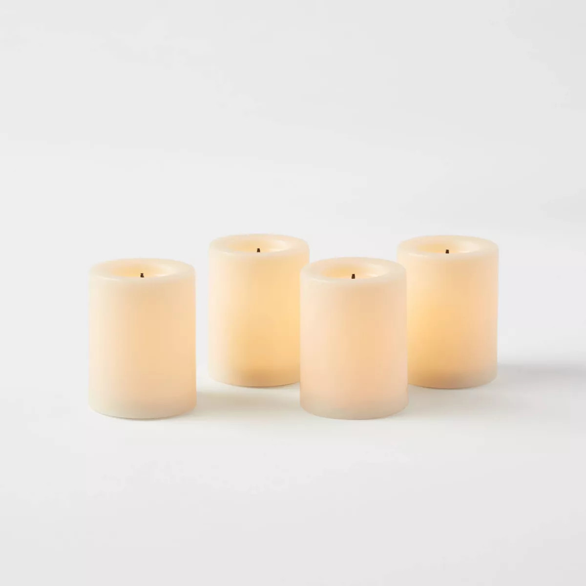 1.82" x 1.4" 4pk LED Votive Flameless Black Wick Candle Cream - Threshold™: Tea Lights, Safe De... | Target