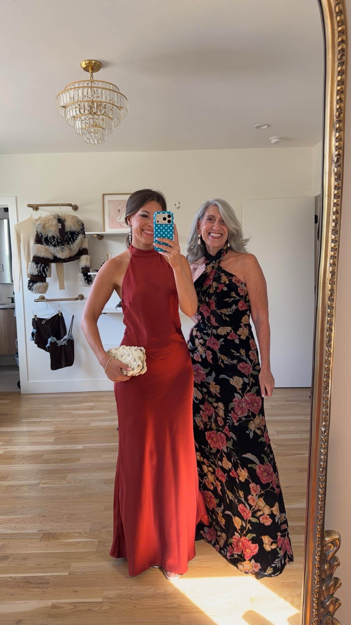 rust red satin halter gown with an open back and a fitted skirt, black halter gown with a crossover neckline and a pink and orange floral print mom and me wedding guest and mother of the bride dresses 💍

revolve: tulip
astr: emerson20
lulus: emerson20 (first purchase) 

I’m 5’4” and wear a size small/2 
xs in the briella fit and flare 

mom is 5’4” and wears a medium/6

fall wedding guest dresses, wedding guest dresses, cocktail dresses, semi-formal dresses, black tie wedding guest dresses, destination wedding guest dresses, garden party dresses, wedding guest outfit ideas, mom & me outfits, mom & me dresses, matching outfits, mother daughter outfits, family photo outfits, wedding guest dresses, mother of the bride, mother of the groom, wedding guest outfit ideas

#LTKU #LTKootd #LTKSeasonal