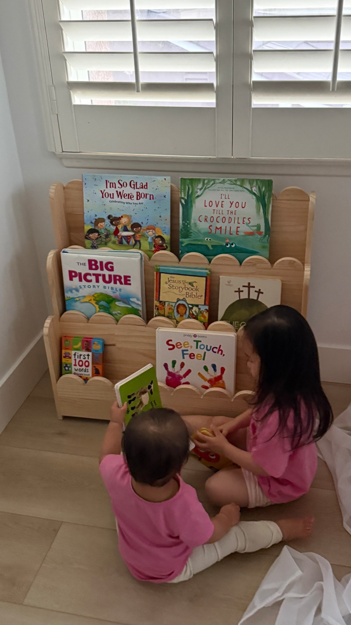 new toddler bookshelf! I told my toddler if she wakes up early, she can read books quietly in her little reading corner and she loves it. #ToddlerBooks #ToddlerMom #toddlerfinds #babybooks #books 

#LTKKids #LTKHome #LTKmomlife