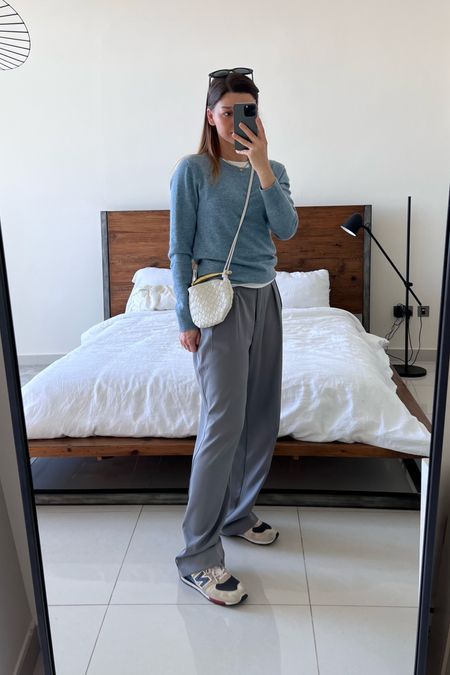 Transitional spring outfit , casual style , blue jumper, gray trousers, Bottega sardine bag, comfy outfit  