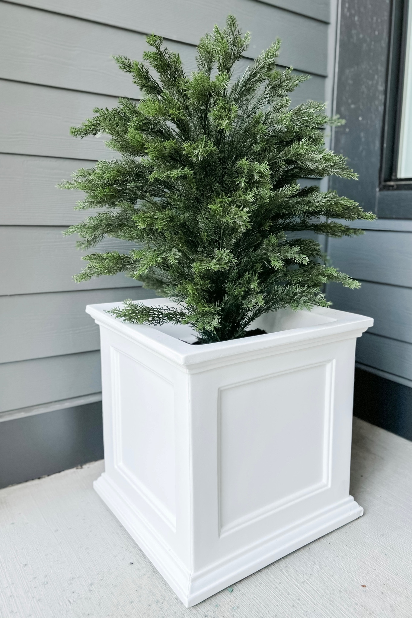 I do NOT have a green thumb, so I relied on Nearly Natural to help me with greenery for our front porch. I’m still playing around with their shape / how deep I want them in the planting soil, but I am loving how they look (and big win for me not having to remember to water / trim them! 😂). 

#LTKhome