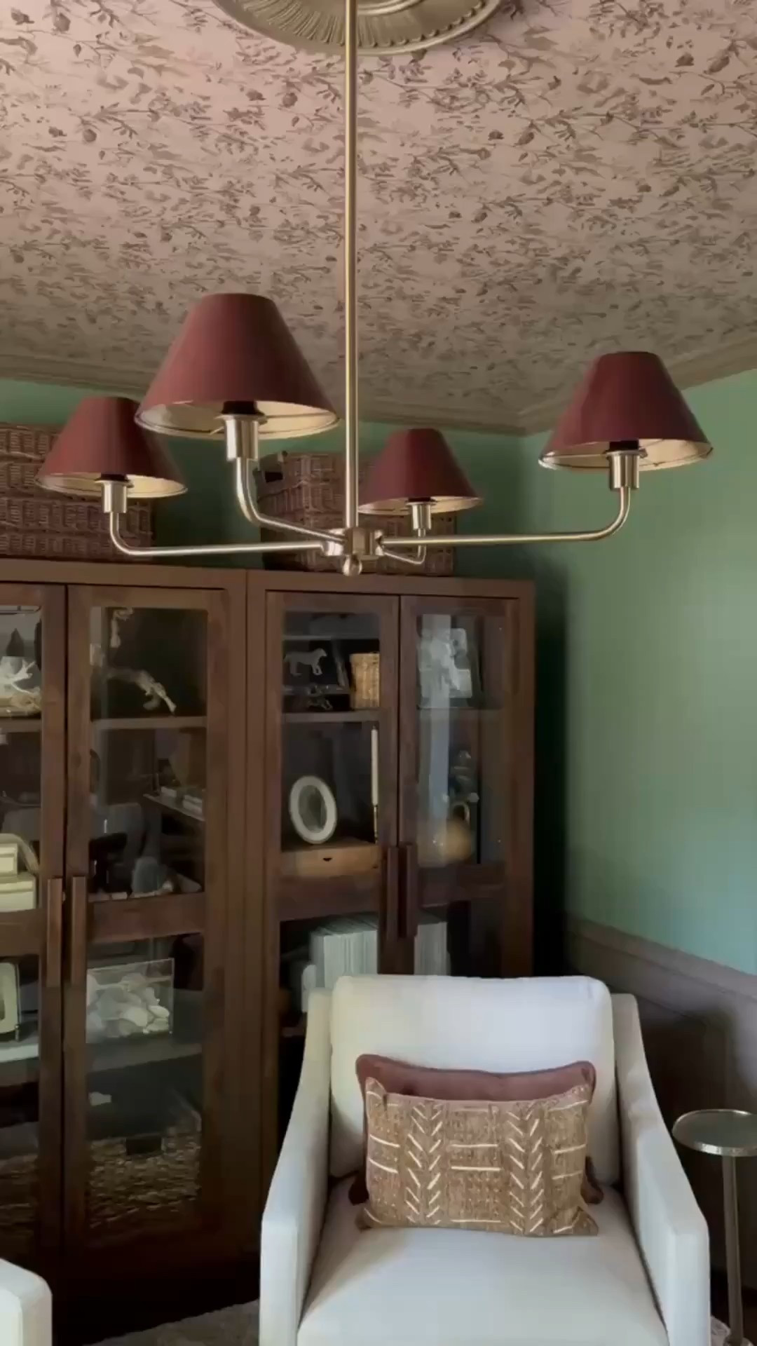 From the floral wallpapered ceiling to the rich wood glass cabinets, this space is all about layered textures and cozy elegance 🌿✨ I styled it with woven baskets, brass lighting, and patterned pillows for that warm, collected feel. Don’t skip the ceiling—it makes all the difference!

🪞Shop similar: wallpaper, rattan baskets, brass chandelier, modern armchairs & neutral decor!

#MoodyInterior #ModernClassicStyle #CeilingWallpaper #GlassCabinetStyling #TexturedDecor #WovenDetails #BrassChandelier #HomeInspo #InteriorStyling #CuratedHome #eanesinteriors


#LTKvlog #LTKOver40 #LTKHome