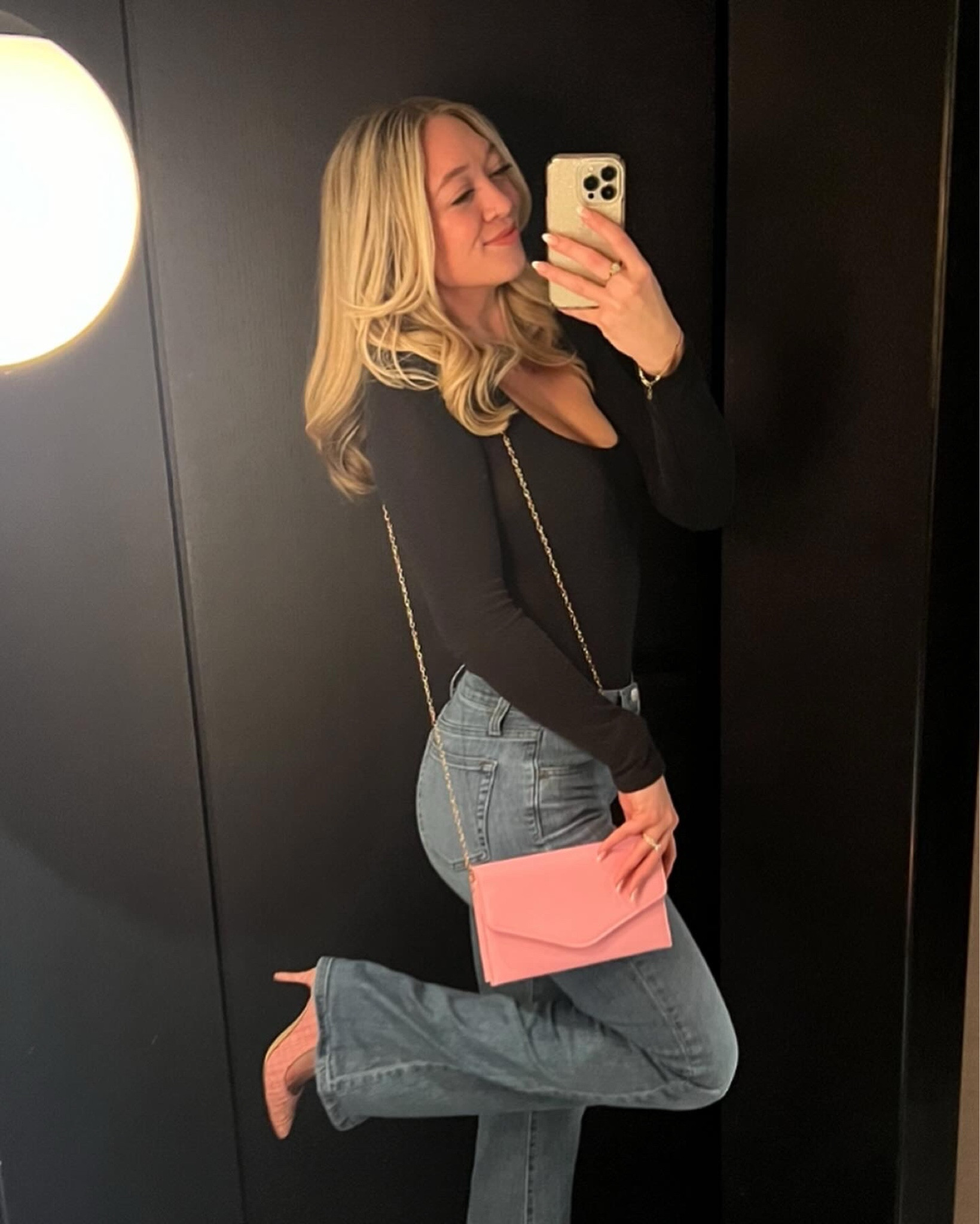 An easy date night outfit - jeans, black long sleeve shirt, pink heels, a pink purse, and Dyson air wrap curls!

Date night, dinner outfit, jeans outfit, spring transition outfit, easy outfit 

#LTKshoecrush #LTKstyletip