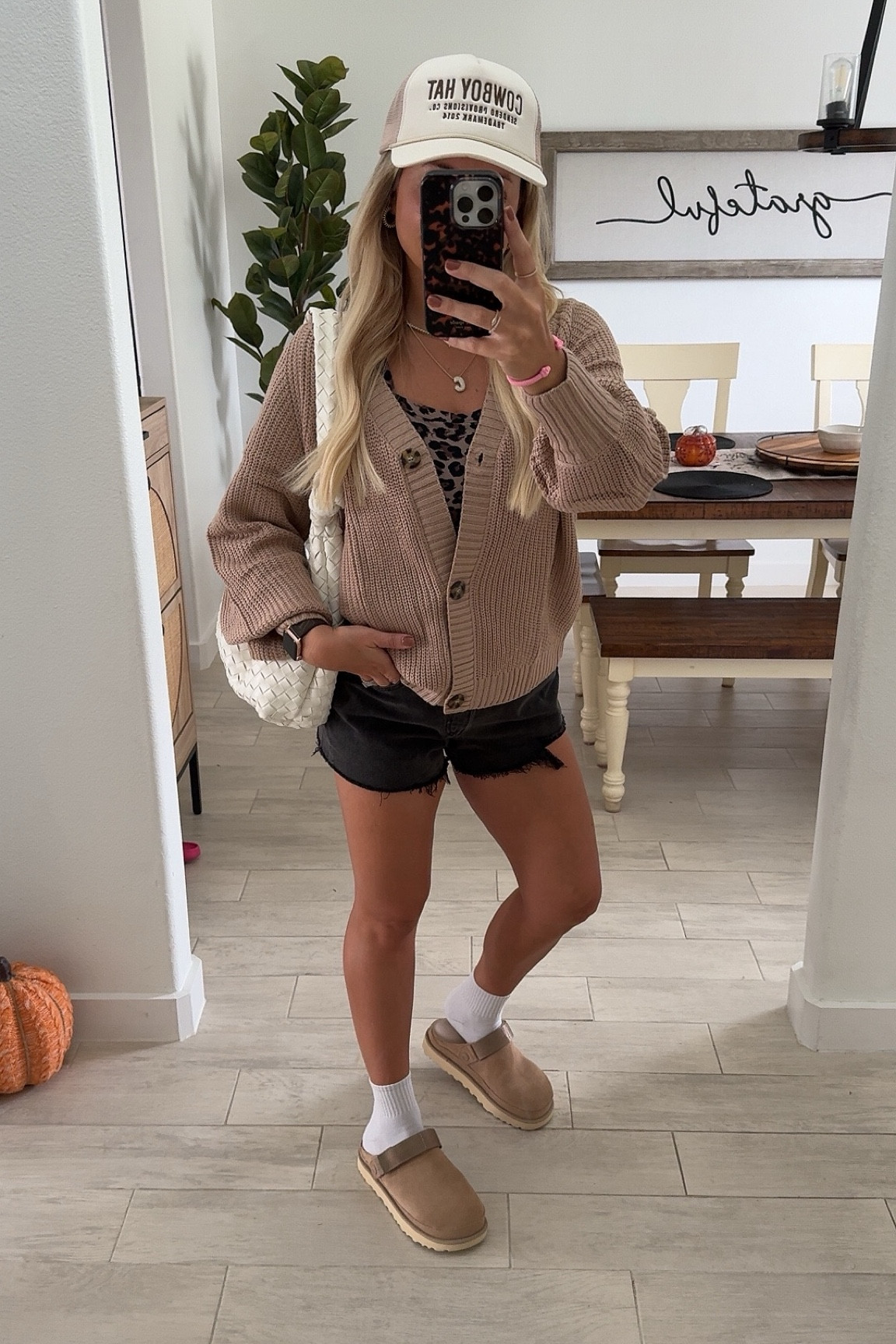 Casual fall outfit inspo
Cardigan small
Leopard tank small
Black denim shorts went up a size 
Ugg goldenstar clog up 1/2 a size 

#LTKFindsUnder50 #LTKShoeCrush #LTKFindsUnder100