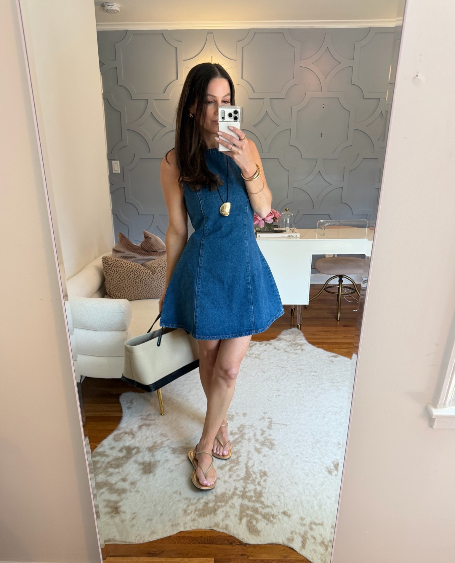 Quite possibly the most flattering little denim dress that exists! I did my true size but if you have a large chest you could size up one. I did my true size in the sandals, too.

#LTKootd #LTKOver40 #LTKSaleAlert