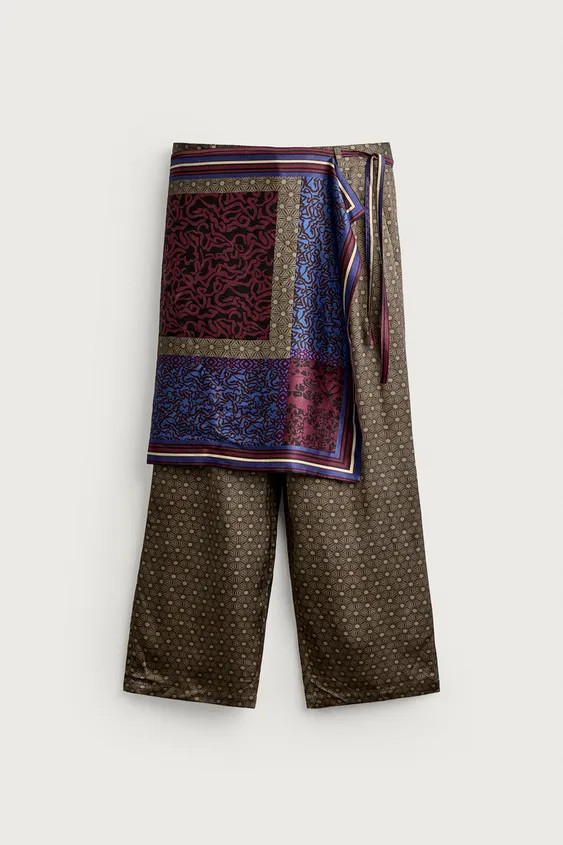 Relaxed fit trousers made of flowing viscose fabric. Adjustable waist featuring a pareo-style tie... | Zara IT