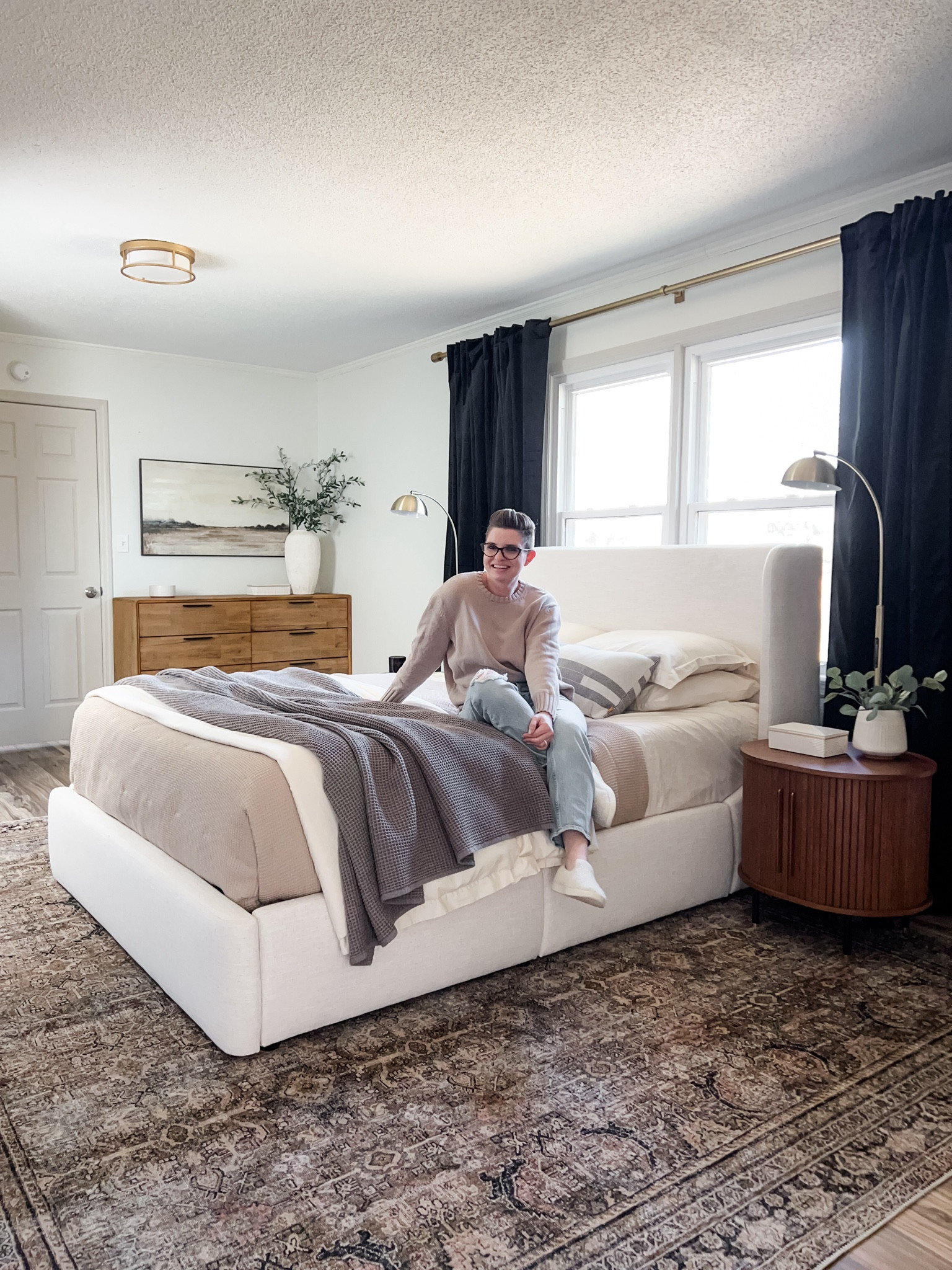 Our bedroom makeover is done and we added SO much extra storage! I’m loving this storage bed from Castlery, and the black curtains and dark rug help balance all the light colors. Dream bedroom achieved!

#LTKhome #LTKMostLoved #LTKSeasonal